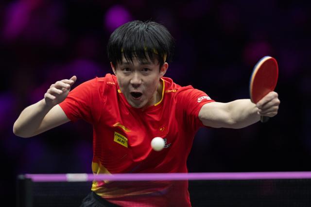 （体育）（7）乒乓球——WTT重庆冠军赛：王楚钦晋级八强XxjpseC007315_20250314_PEPFN0A001.jpg